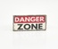 Tile, 1 x 2 с изображением Danger zone